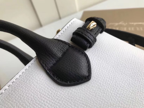 B**rry the small banner in leather and house check