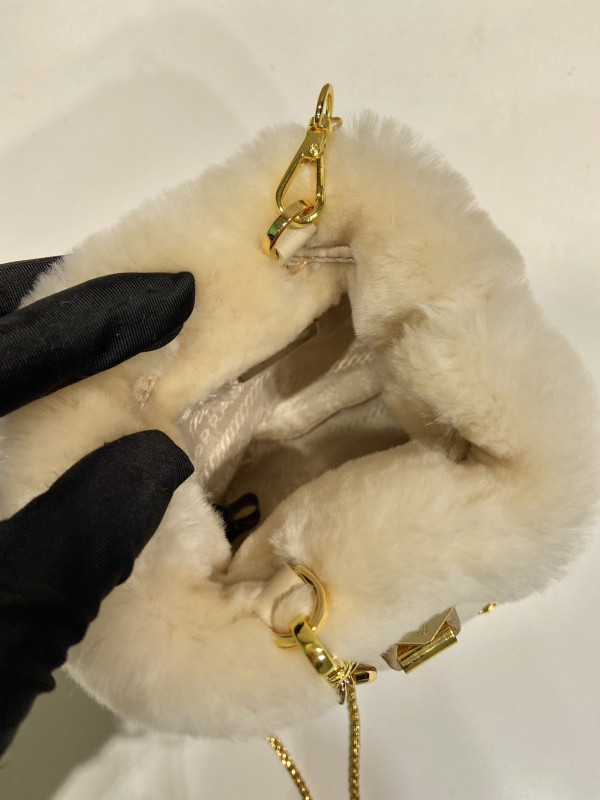 Pra*a shearling bucket bag