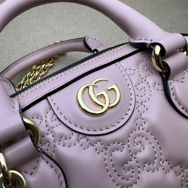 G*u*i gg matelassé leather top handle bag