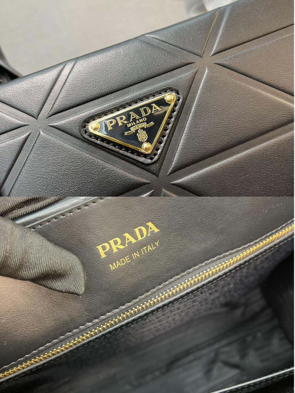 Pra*a symbole large leather bag $ 4,200